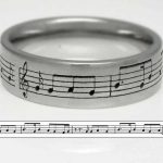 Platinum wedding ring. Laser engraved with the couples first dance