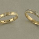 18ct yellow and white gold, diamond set, wedding rings