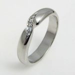 Platinum twisted, diamond set wedding band