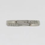 Diamond set, 18ct white gold twist ring.