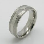 Platinum wedding ring with both a hammered and polished finish