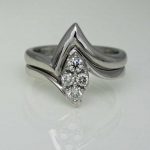Platinum engagement ring with a handmade filled wedding ring