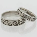 His and her's Platinum wedding rings laser engraved with Celtic knot