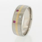 Platinum and 18ct gold men's wedding band set with a diamond and two rubies