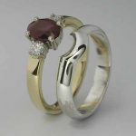 Ruby and diamond engagement ring with an white gold fitted wedding ring