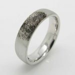 Platinum wedding band. Laser engraved bride's finger print