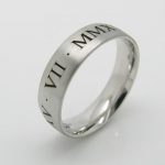 Platinum wedding band. Laser engraved with wedding date