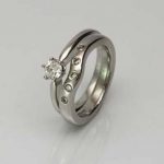 Platinum, diamond set, fitted wedding set