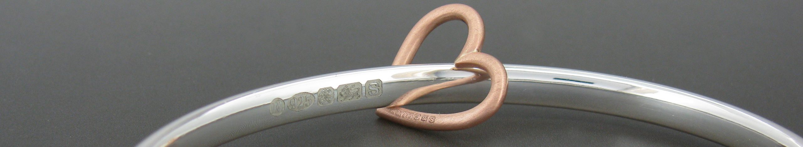 Bangel with heart charm